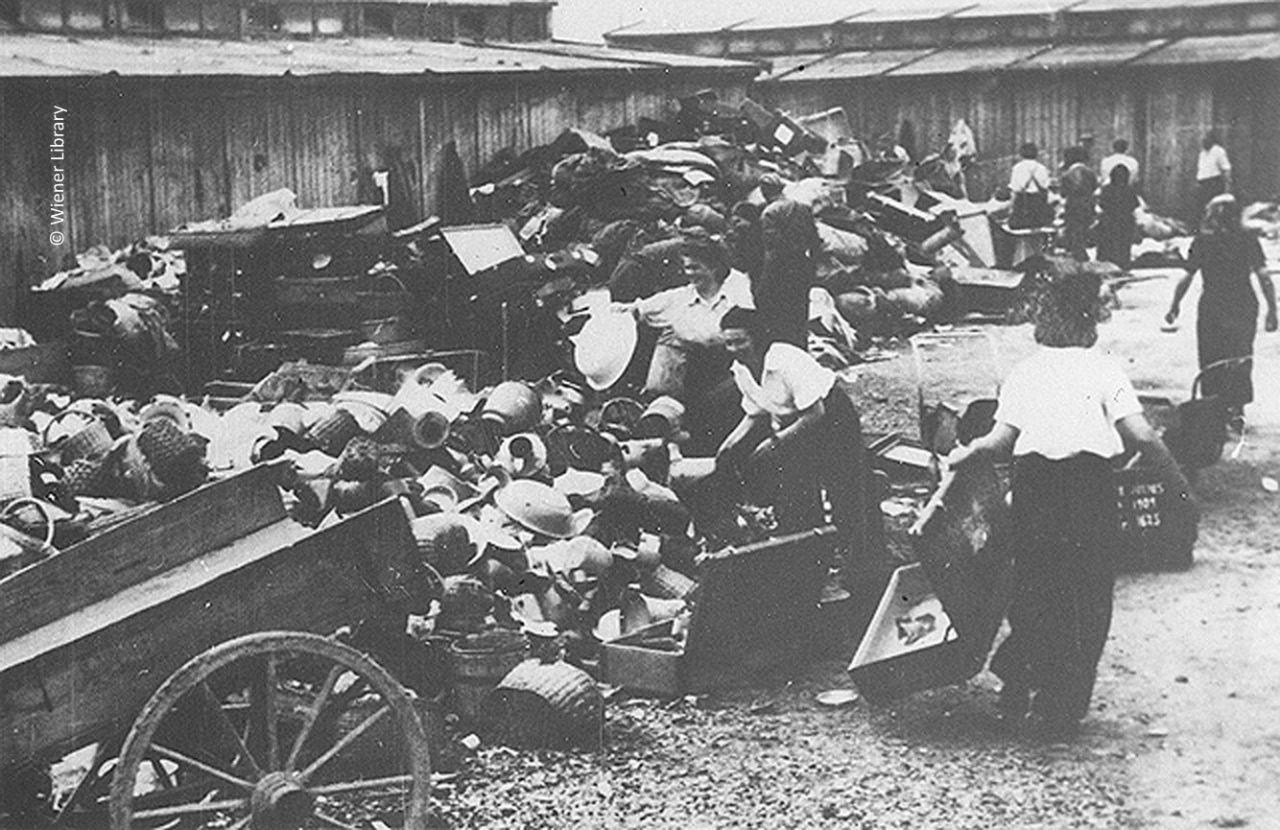 253. Female Inmates Sorting Belongings Of Gassed Jews At The Kanada Store In June 1944 1280x830 