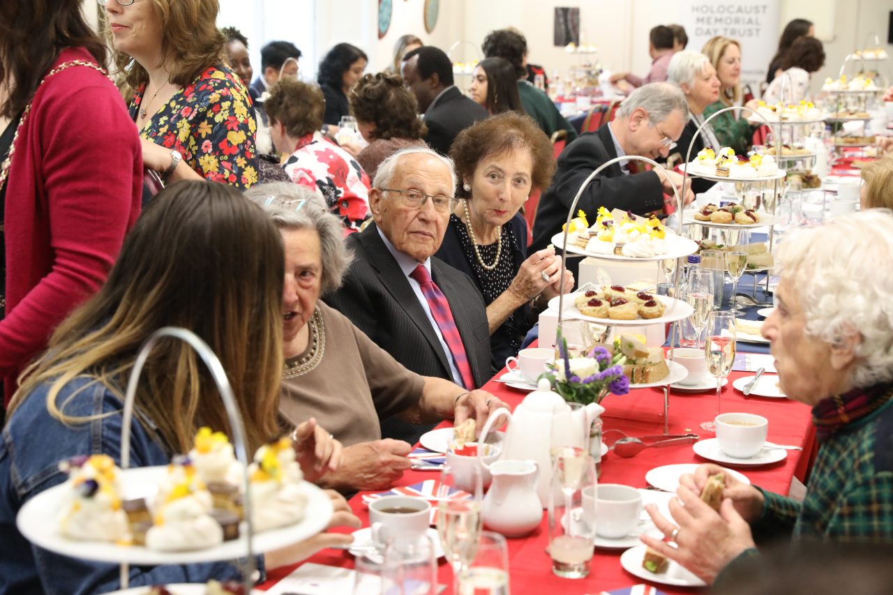 We hold a Platinum Jubilee Tea Party for Holocaust and genocide survivors