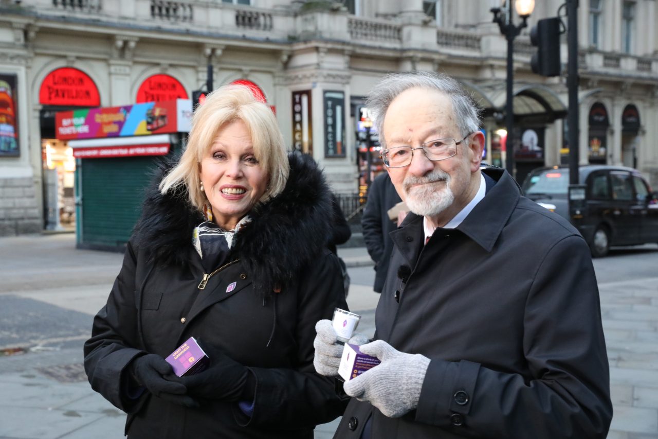 Dame Joanna Lumley and Dr Martin Stern MBE, a survivor of the Holocaust, give out commemorative HMD candles