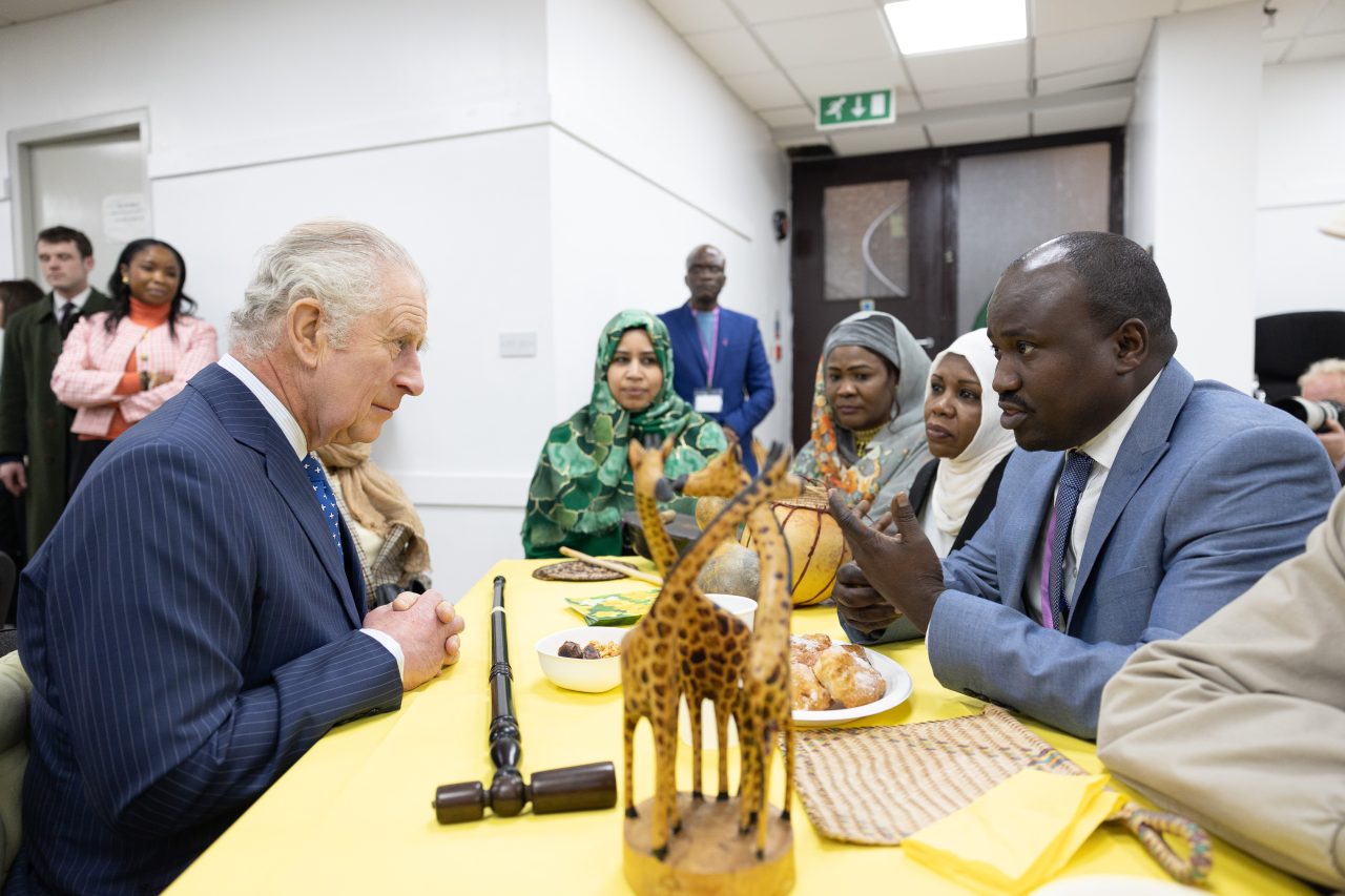 HM The King speaks with members of the Sudanese community © Sam Churchill